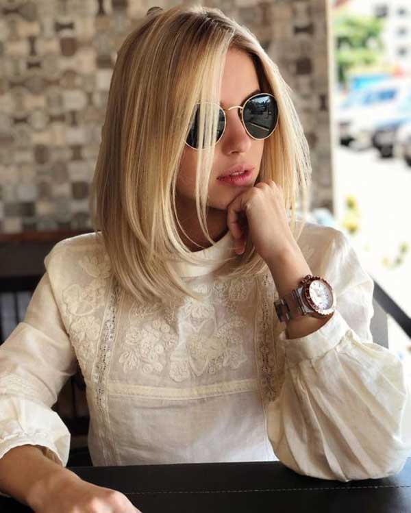 Coupe de cheveux sous les épaules sans frange