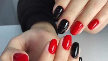 Photo de conception de manucure rouge et noire