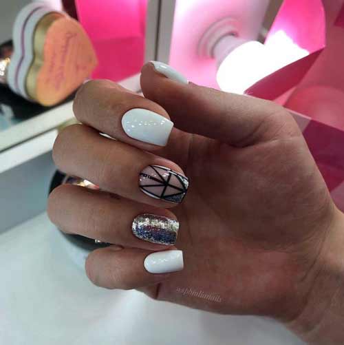 Géométrie noire et blanche sur les ongles